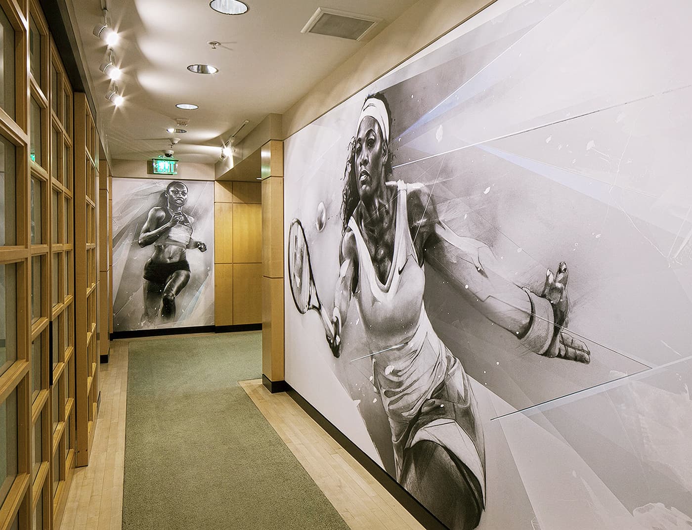 Nike hallway installation with tennis and track murals