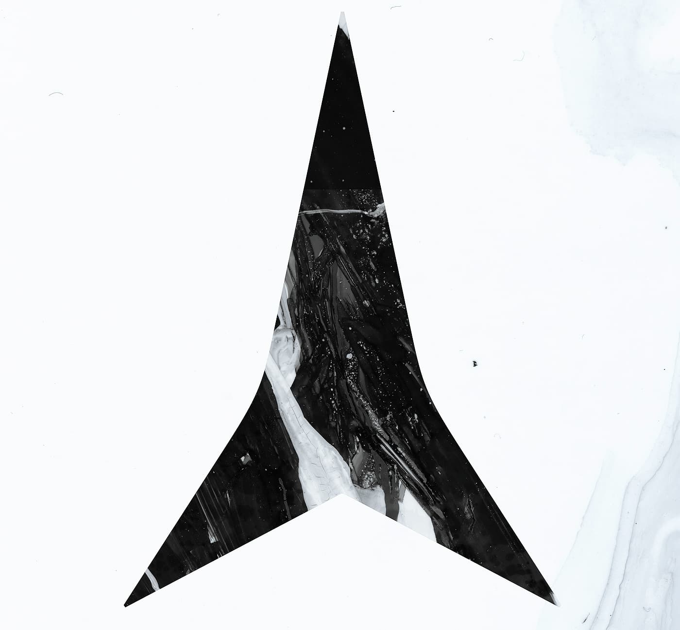 Close-up of the Atomic logo on the Atomic Infamous ski graphic with black marble-style texture on a white background