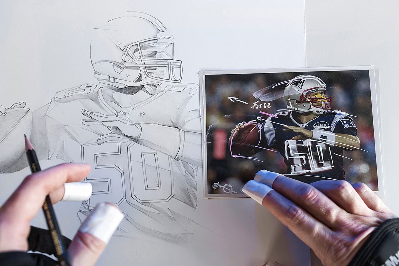 Pencil football player sketch beside annotated reference photo