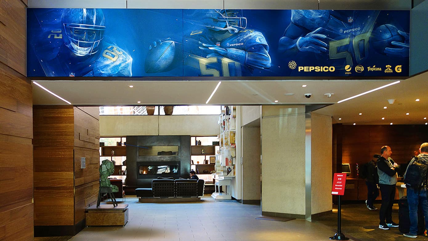 Pep City 2016 graphics installed above a hotel lobby entrance